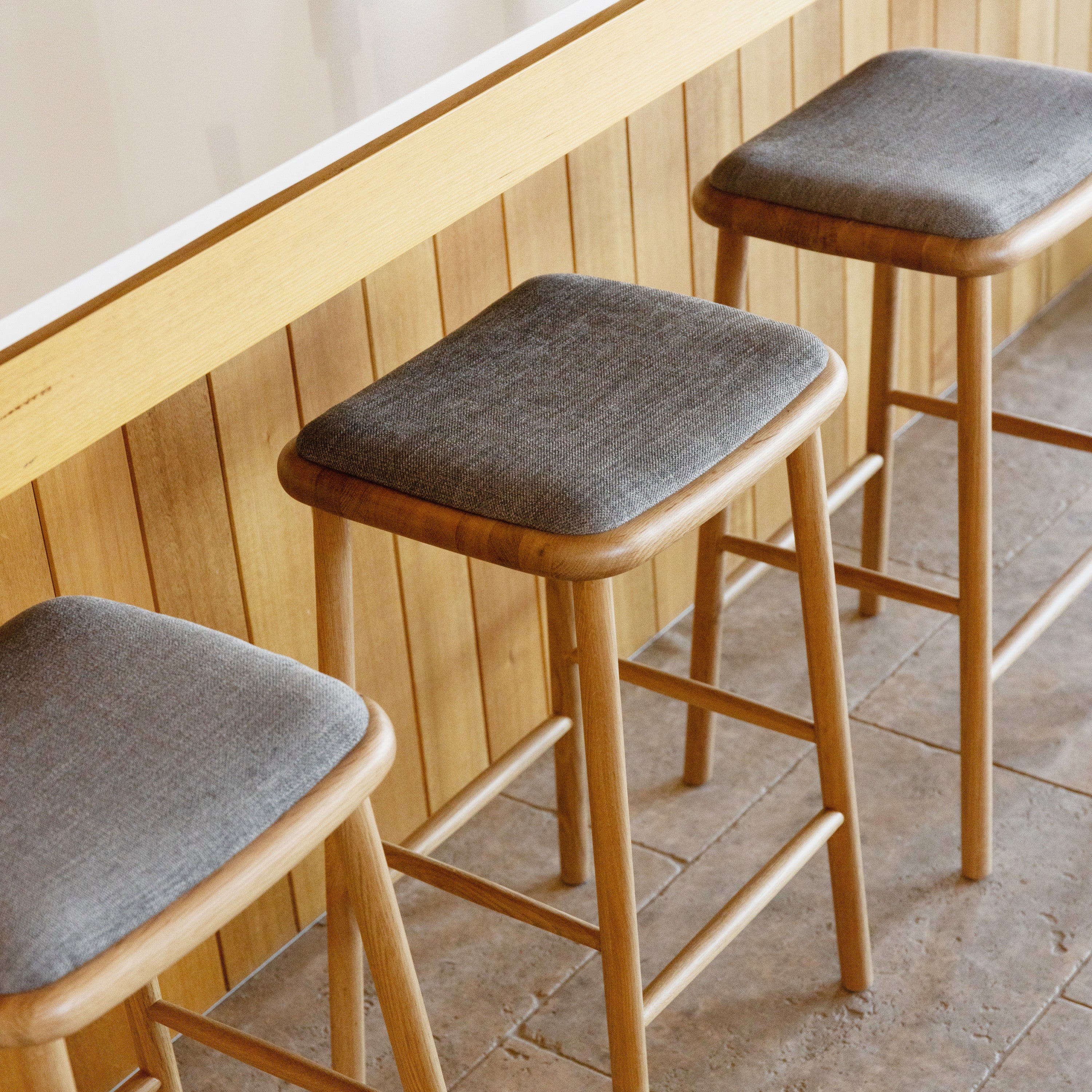 anton-bar-stool-oak-pewter-grey-fabric-DF8CA1--lifestyle-2-sq