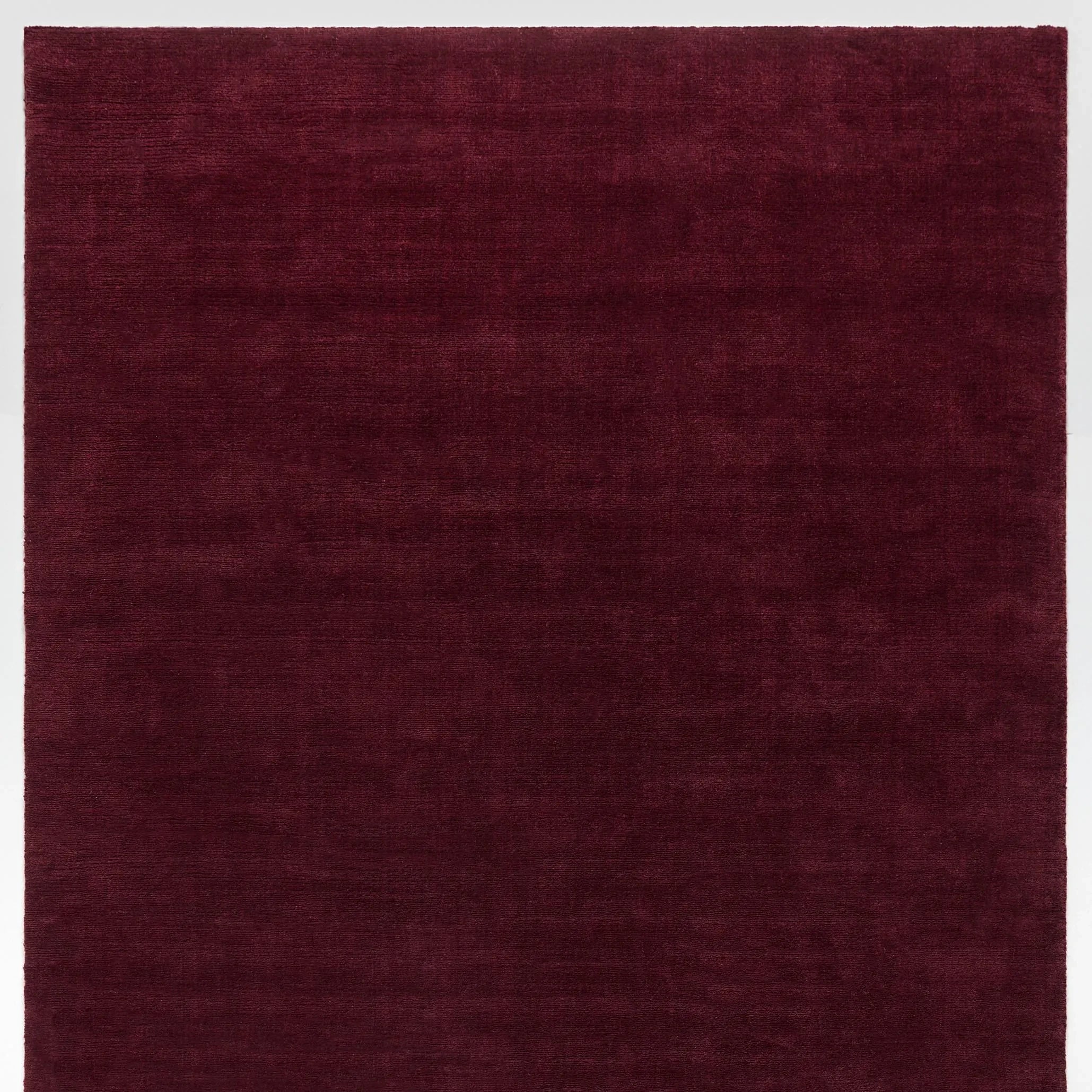iconbydesign-freya-nz-wool-rug-berry-red--SHARED--studio-a_flatlay.webp