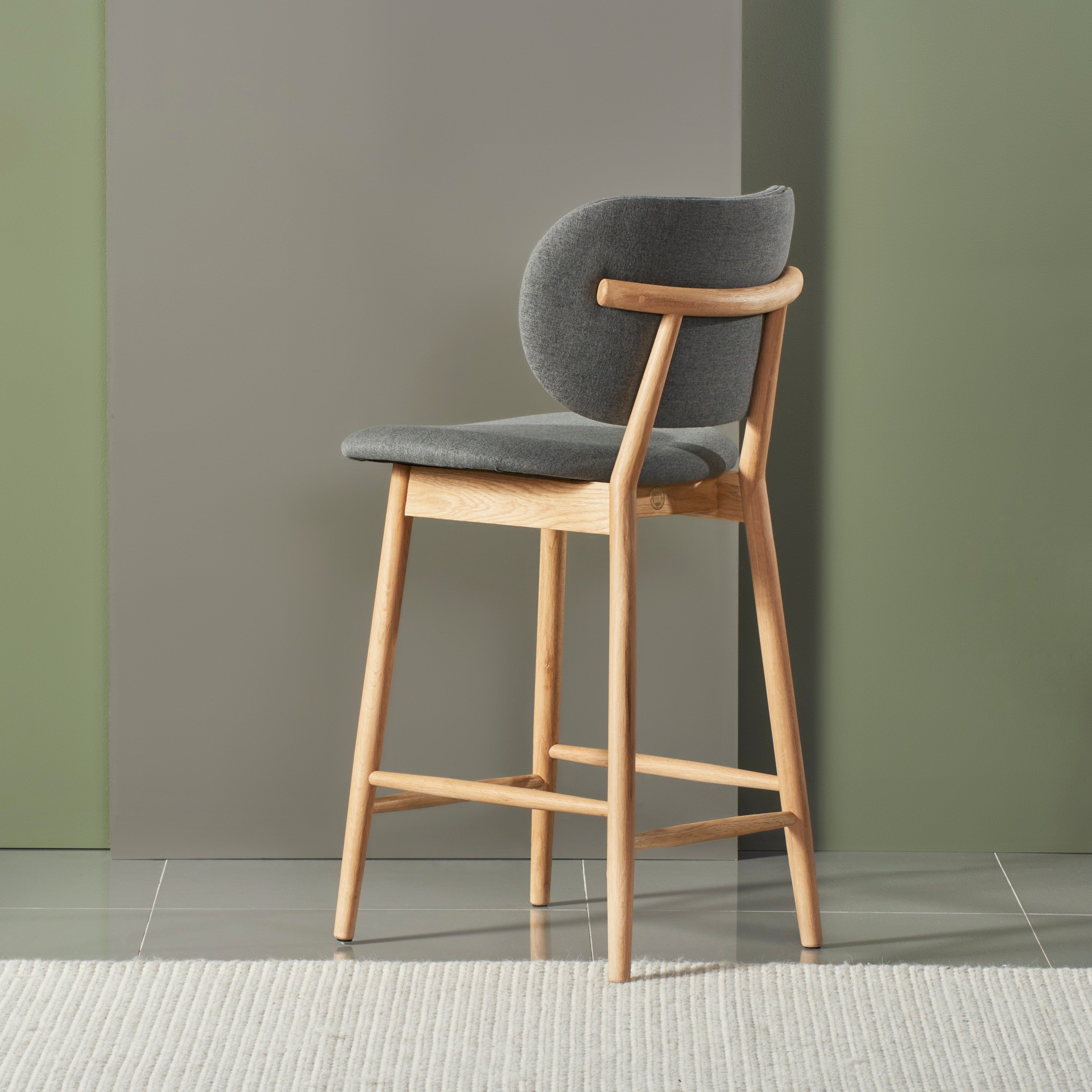 iconbydesign-olivia-bar-stool-oak-graphite-grey-fabric--DF6OA1--studio-d_shot-back-left_ckovsc