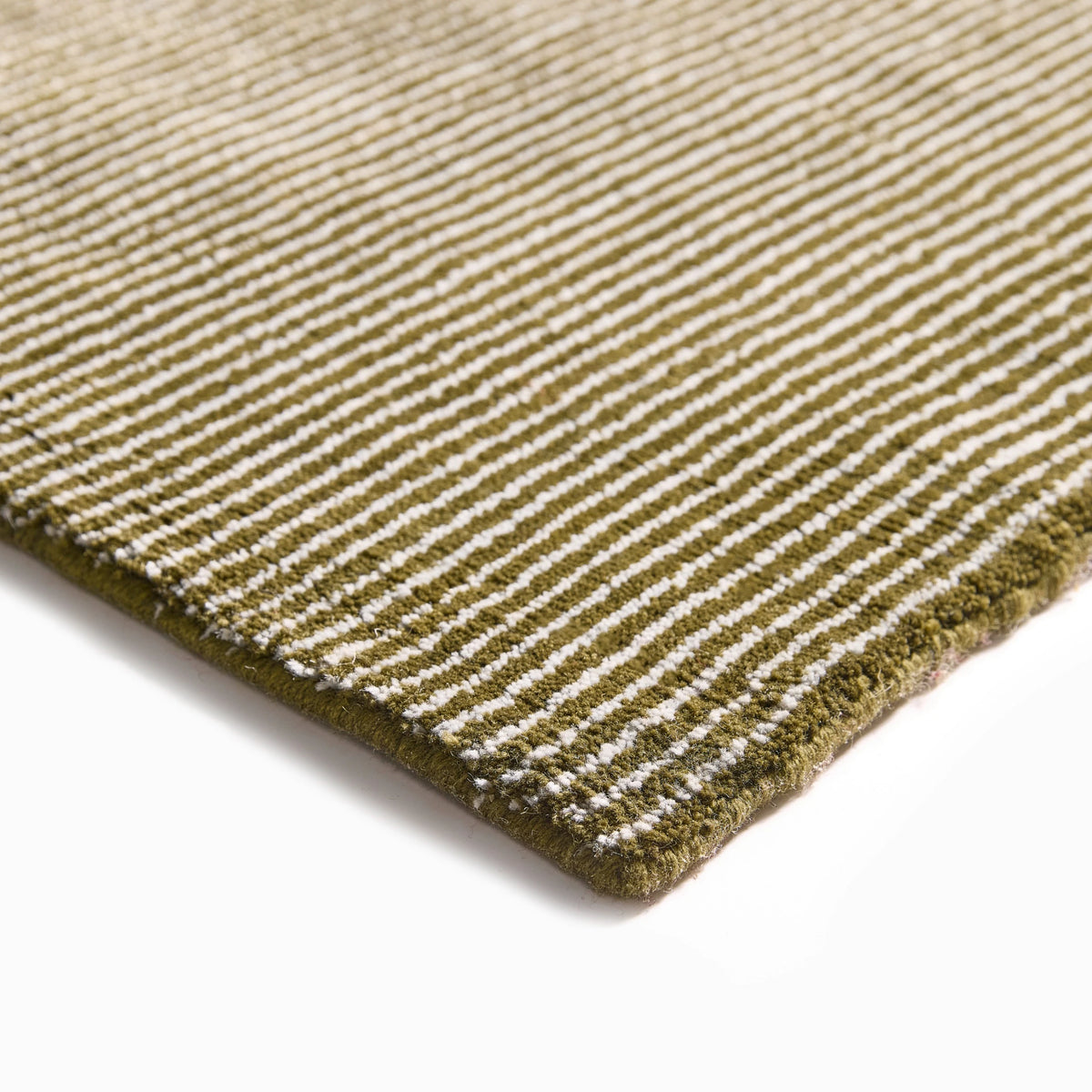 iconbydesign-trea-nz-wool-rug-nori-green--SHARED--studio-a_detail-corner.webp