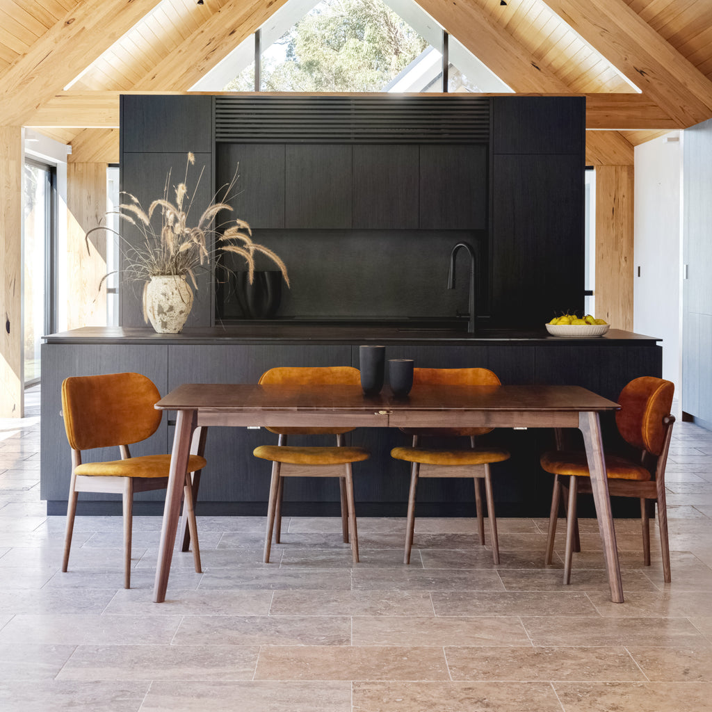 magnus-dining-table-chair-walnut-olivia-dining_chair-mustard-fabric--SHARED--lifestyle-1-sq