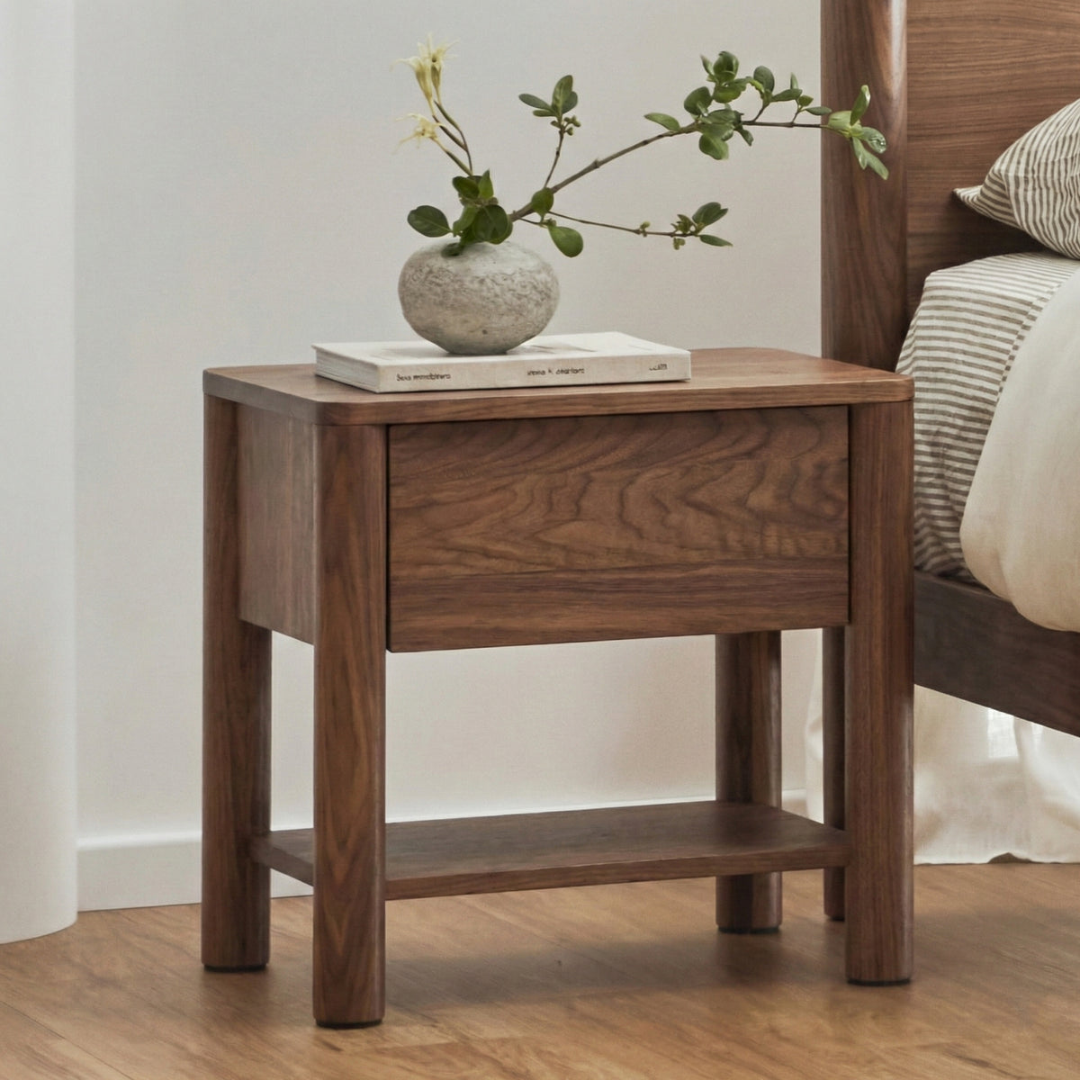 olivia-bedside-table-one-drawer-walnut-BB8ABA-studio-angle-front-left.jpg